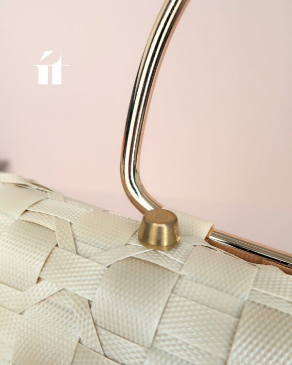 Close-up of brass fittings on the Urban Weave Bag, showing durable handcrafted details