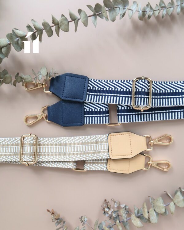 Close-up of adjustable woven strap with metal fittings on the Urban Weave Bag, wide and comfortable on the shoulder