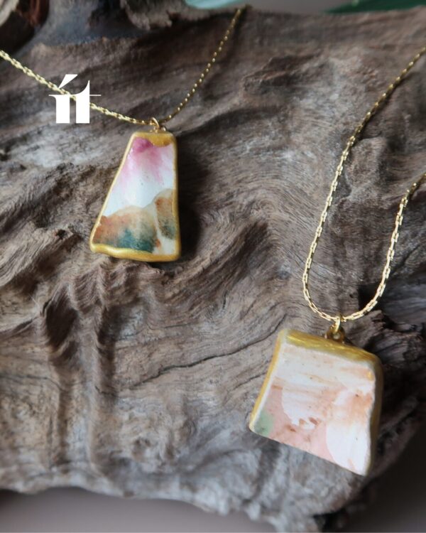 Kintsugi Necklace Kakera Collection - Two Variations Two Kintsugi necklaces from the Kakera collection featuring Song Be pottery shards with resin and gold leaf